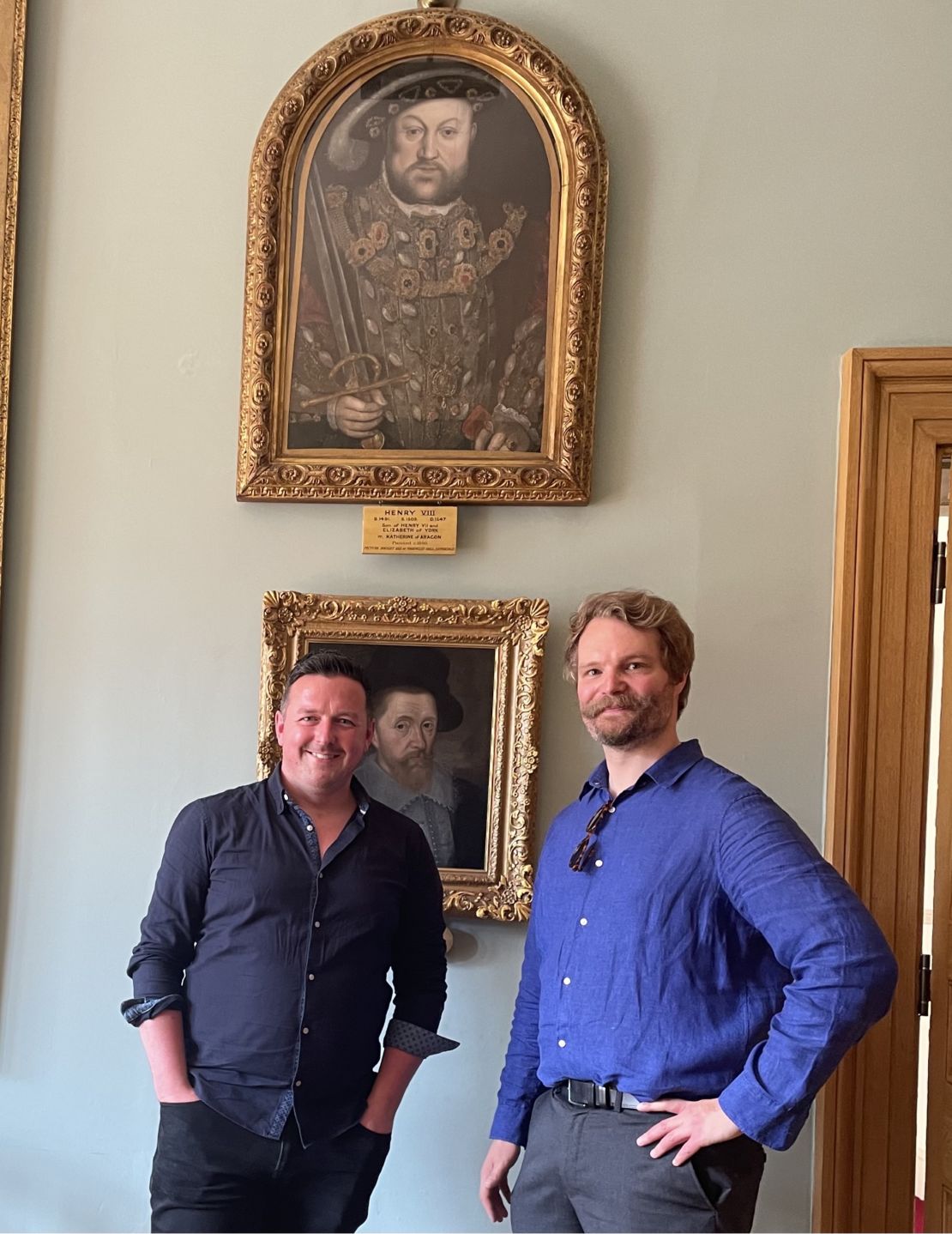 Local historian Aaron Manning (L) and art historian Adam Busiakiewicz at Warwick's Shire Hall, where the painting was found