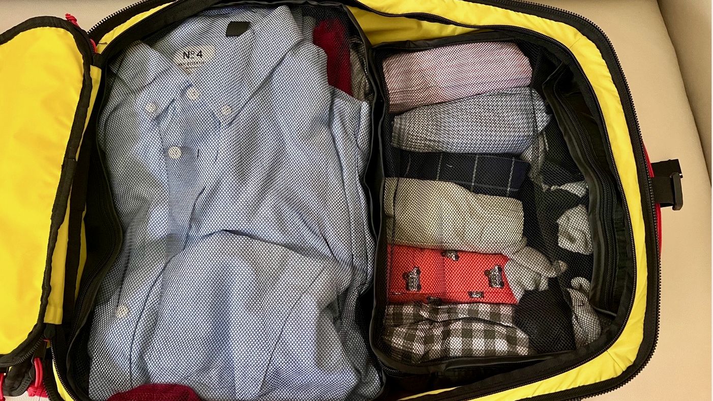 A photo of HOTOR Packing Cubes in a travel backpack