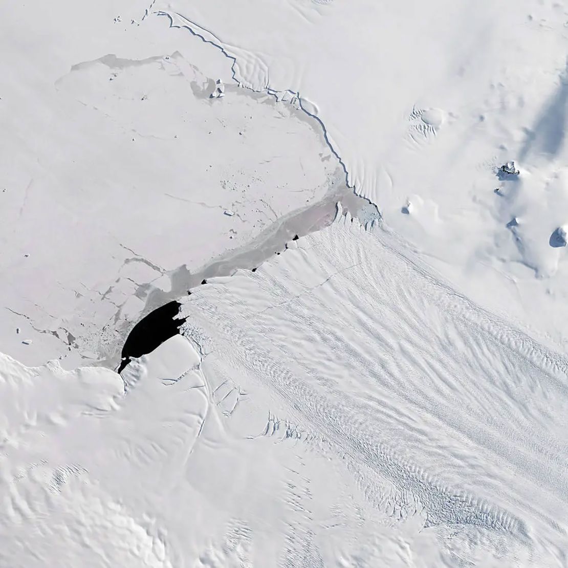 A 2017 photo shows a new iceberg calved from Pine Island Glacier, one of the main outlets where ice from the West Antarctic Ice Sheet flows into the ocean.