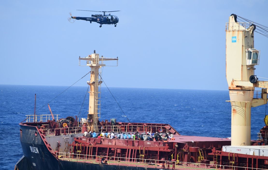 A helicopter flies over the commercial vessel MV Ruen during an Indian military anti-piracy operation last weekend.