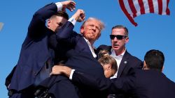 Republican presidential candidate former President Donald Trump is surround by U.S. Secret Service agents at a campaign rally, Saturday, July 13, 2024, in Butler, Pa. (AP Photo/Evan Vucci)