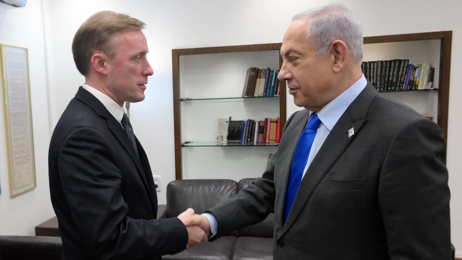 In this handout photo from the Israel Government Press Office, US National Security Adviser Jake Sullivan shakes hands with Israeli Prime Minister Benjamin Netanyahu at The Kirya in Tel Aviv on Thursday, December 14, 2023.