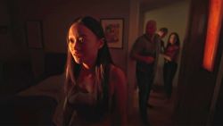 Callina Liang, Chris Sullivan, Eddy Maday, and Lucy Liu in a scene from "Presence"