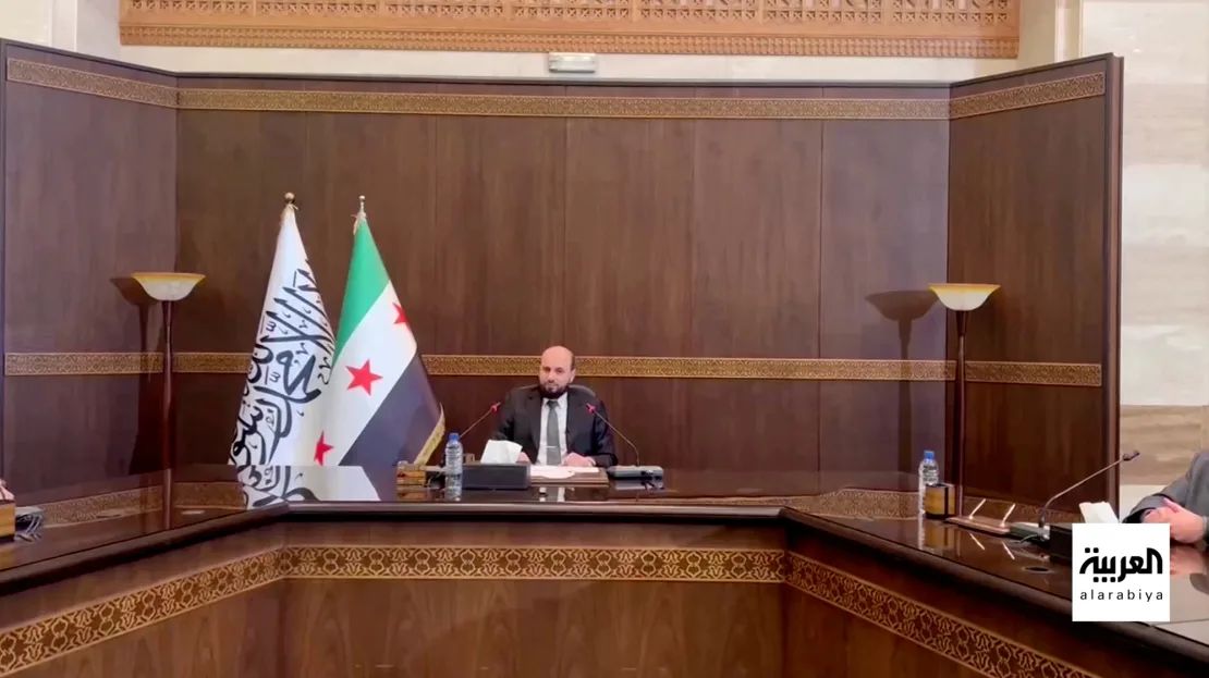 El primer ministro interino sirio, Mohamed al-Bashir, asiste a una reunión con el gabinete de transición después de que los rebeldes sirios derrocaran al presidente Bashar al-Assad, en Damasco, Siria, el martes.