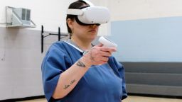 An inmate at Maryland's Correctional Institution for Women wears a virtual reality headset during job training.