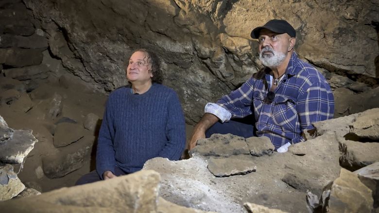 Professor Bruno David (L) and Uncle Russell Mullett (R) pictured in the cave.
