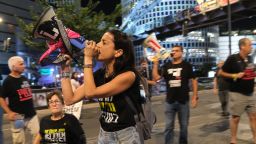 Demonstrators block a major thoroughfare in Tel Aviv, protesting against the government and demanding a ceasefire deal on October 19, 2024. 