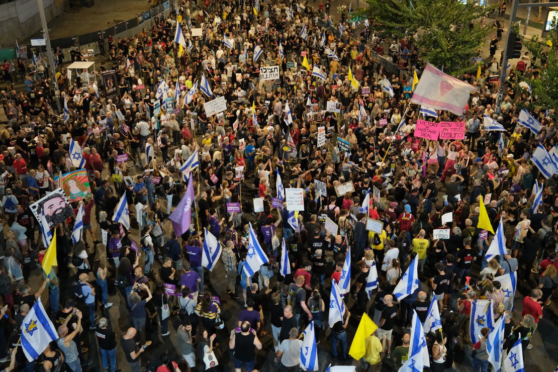 Demonstrators block a major thoroughfare in Tel Aviv on October 19, 2024, protesting against the government and demanding a ceasefire deal.