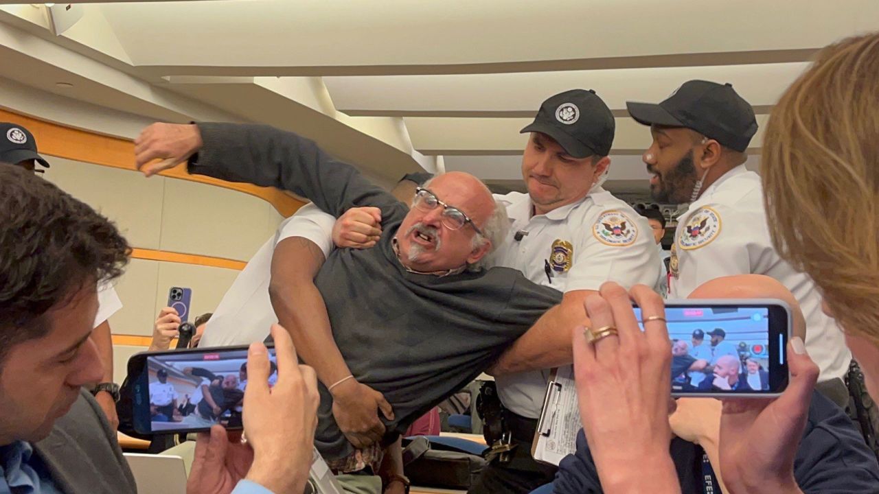 Protester and independent journalist Sam Husseini is removed from Secretary of State Antony Blinken’s press conference at the State Department building in Washington, DC, on Thursday, January 16, 2025, after repeatedly interrupting Blinken.