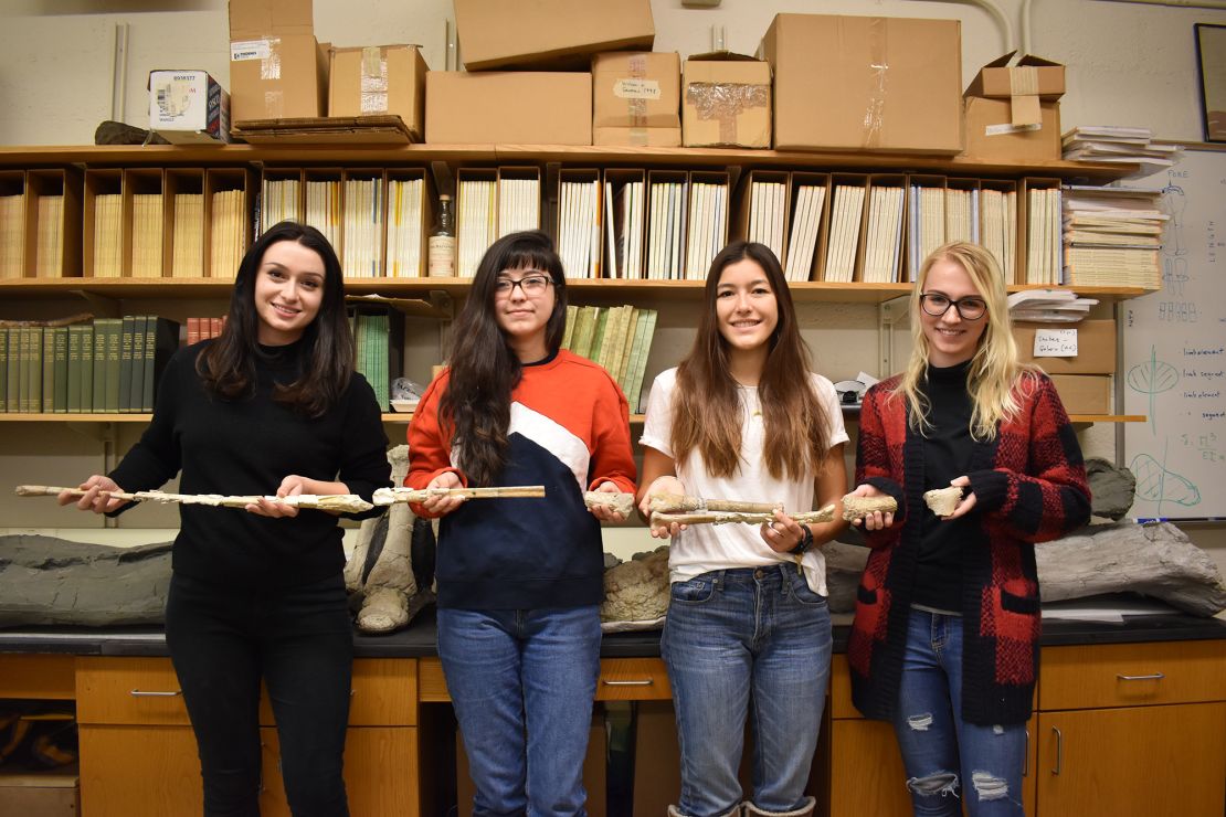 Holding the wing bones of Inabtanin (from left) are lead study author Dr. Kierstin Rosenbach, research assistants Monique Perez and Stacy Kaneko, and study coauthor Danielle Goodvin.