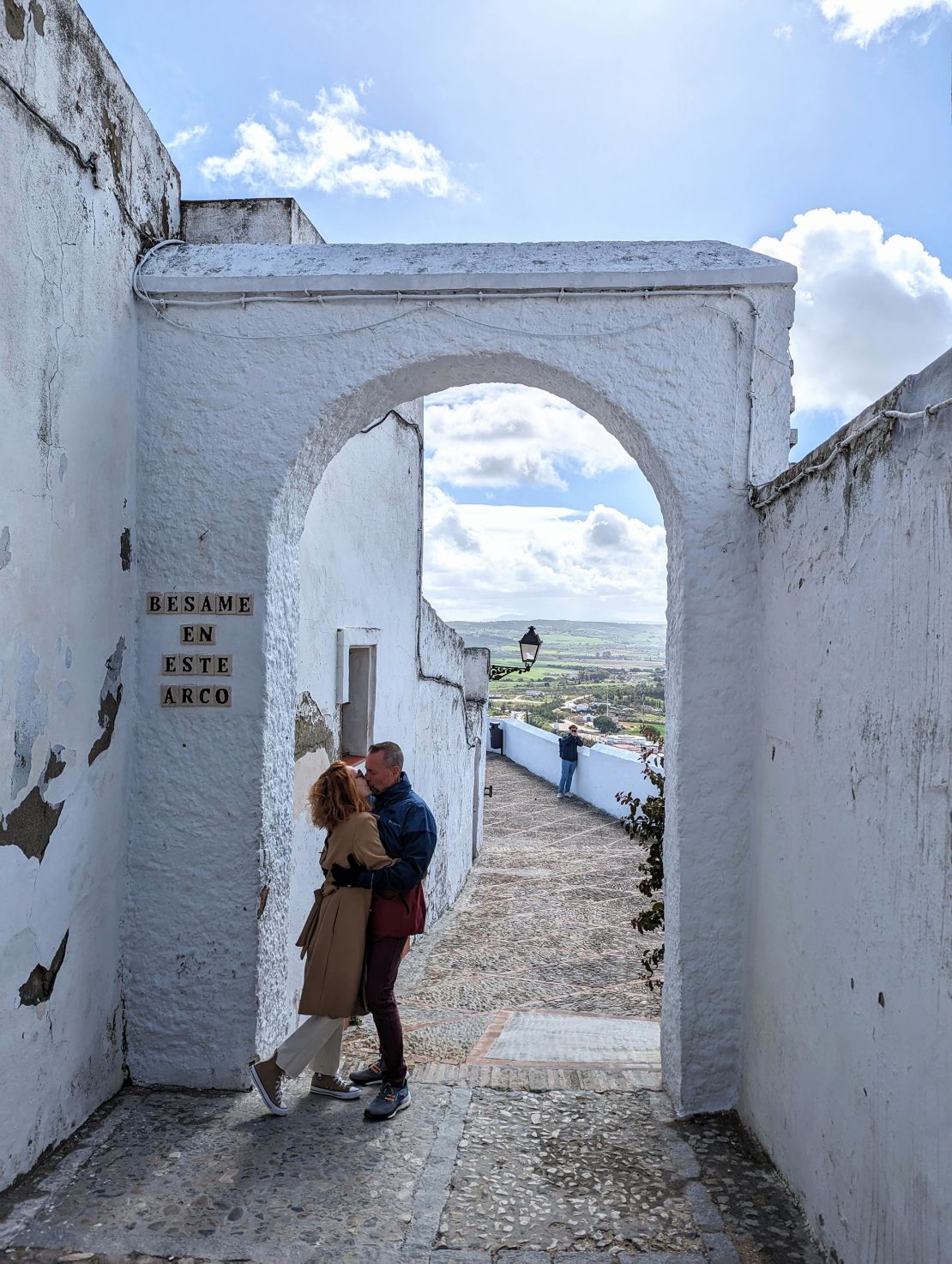 Gail and Greg share a tender moment in a pueblo in Andalucía, during a visit to celebrate a friend's birthday.