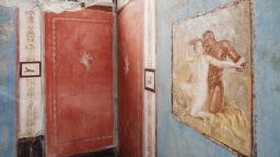 A tiny house adorned with erotic frescoes has been uncovered at the Italian archeological site of Pompeii. 