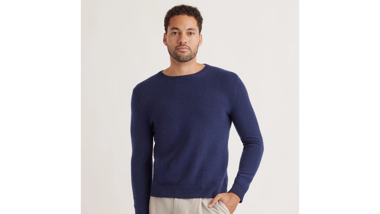 Man wearing navy mongolian cashmere sweater from Quince