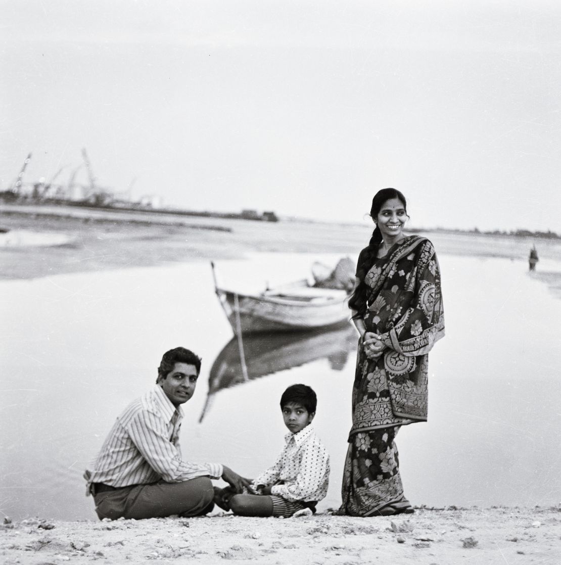 Ramesh Shukla (left) with his wife, Taru, and son, Neel, by the banks of Dubai Creek in the 1970s.