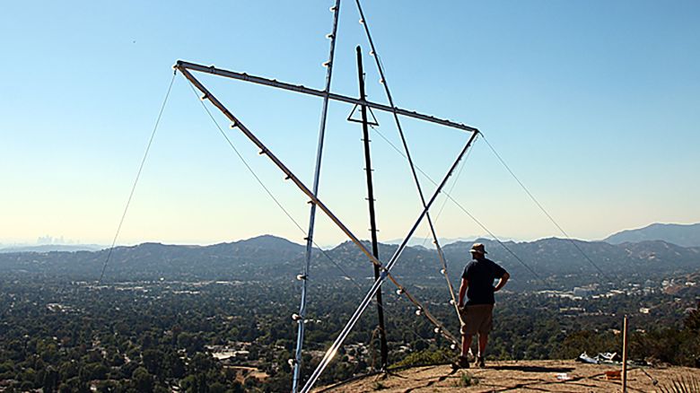 Once assembled, the new lights were attached. We used 40-Watt Equivalent LED Bulbs to replicate the lights used on the original Star by F. B. Nightingale. The Star is also anchored to the front and rear to minimize stress during high winds. Jonathon Andrews admires our work. 2019
