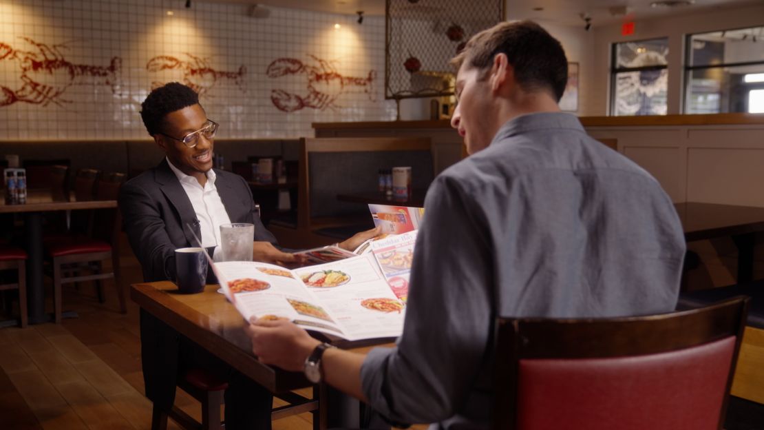 Red Lobster's new chief executive Damola Adamolekun during an interview with CNN at a Red Lobster in Long Island, New York, last week.