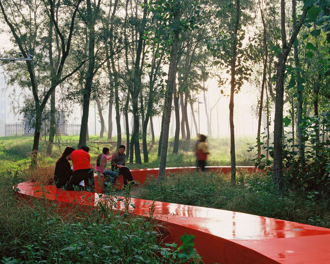 Visitors walk through Red Ribbon Park in Qinghuandao, in China's Hebei province.