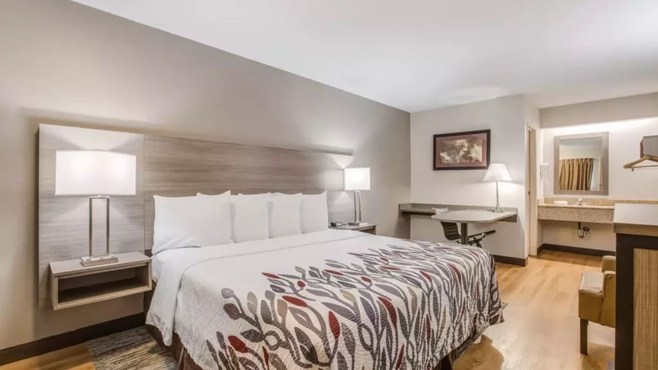 A photo of a hotel room at a Red Roof Inn property