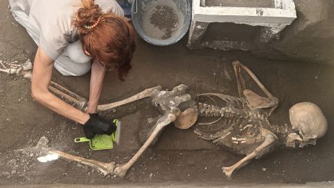 Archaeologists have uncovered the bodies of a man and a woman with their treasure in Pompeii.