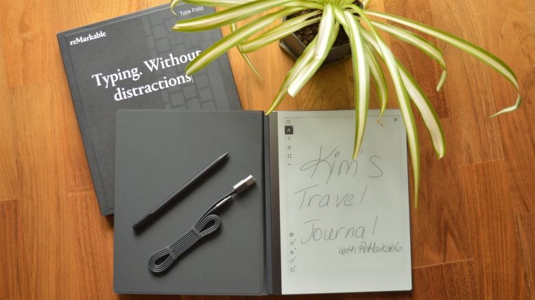 A photo of the Remarkable 2 Paper Tablet on a table next to a plant