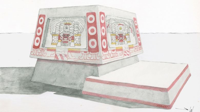 A reconstruction of the altar illustrates the painted panels of red, black and yellow which would have depicted a person wearing a feathered headdress and flanked by shields or regalia.