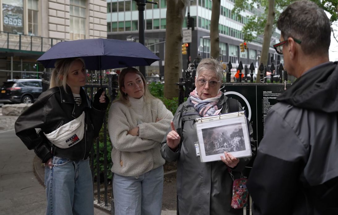 Guide Renée Rewiski leads a recent walking tour in the lower Manhattan area of New York City. 