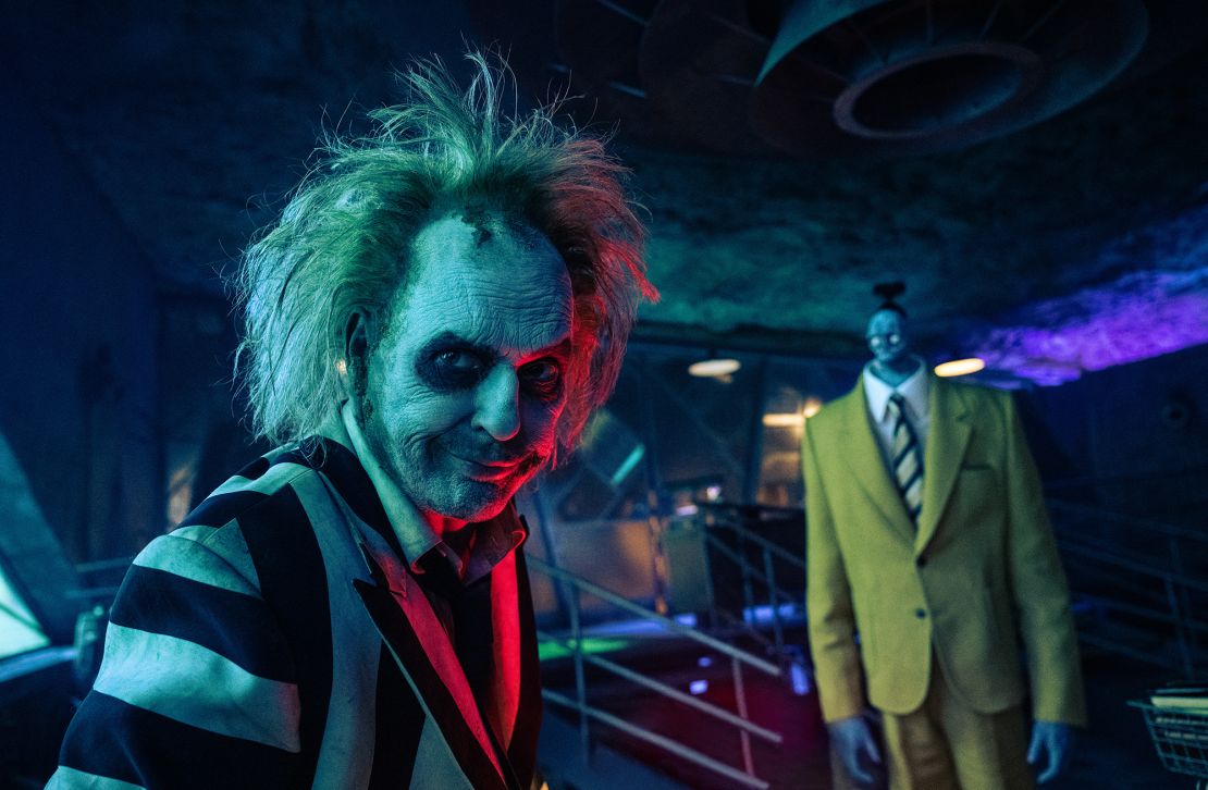 Beetlejuice and Bob the shrinker, whose gold suit was inspired by Century 21 Real Estate employees of the 1980s.