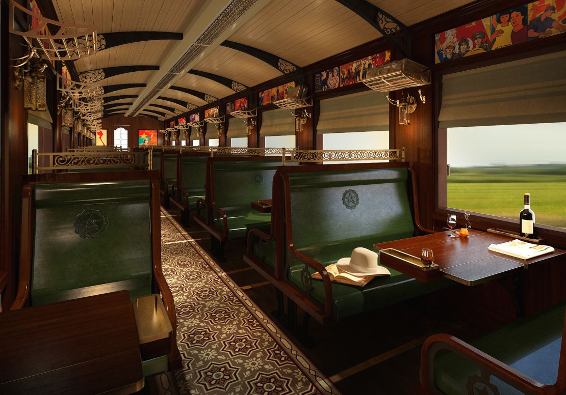 A rendering shows the interior of a dining car in the Revolution Express, furnished to reflect the train's French colonial history.