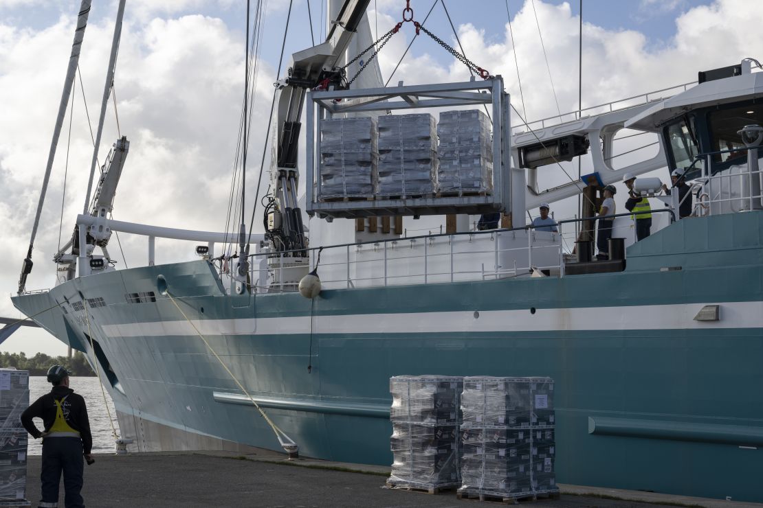 Cargo is unloaded off of the Anemos ship in New York.