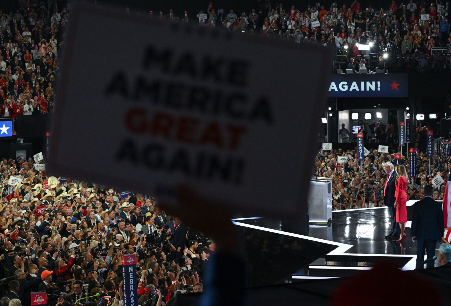 The Trumps appear on stage together at the end of his speech.