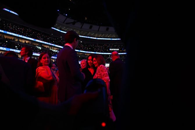 Former House Speaker Nancy Pelosi, center right, poses for a photo on Tuesday.