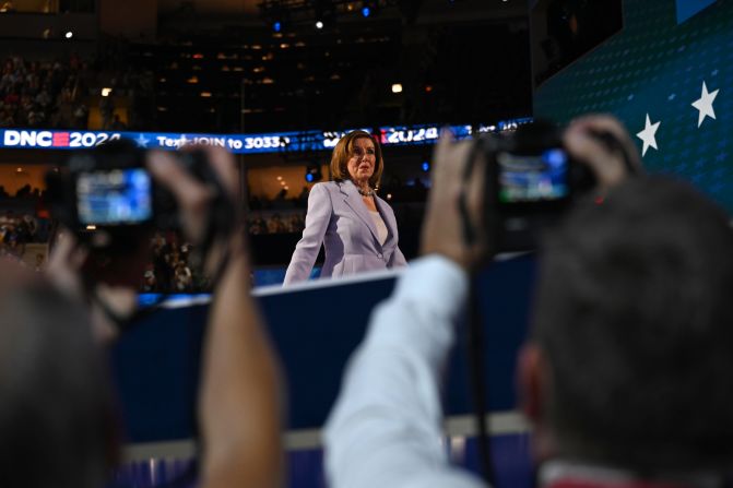 Former House Speaker Nancy Pelosi walks on stage to give a speech on Wednesday. 