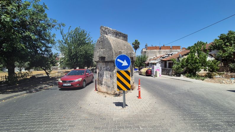 <strong>Keep right:</strong> This Lycian-style tomb, believed to date from Roman times, sits in the middle of a road on the outskirts of the Turkish city of Fethiye.