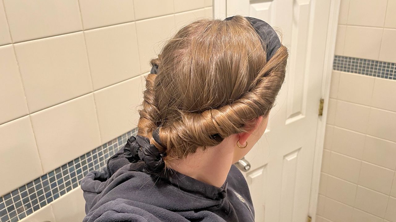 Woman wearing RobeCurls satin heatless hair curlers