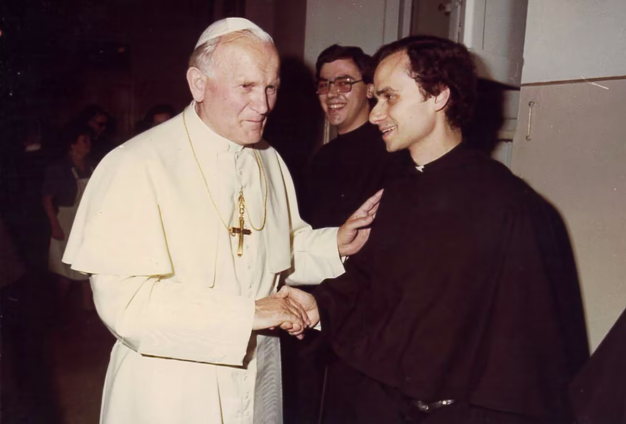 In this undated picture Robert Francis Prevost greets Pope John Paul II.