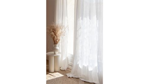 White linen curtain panel with rod pocket