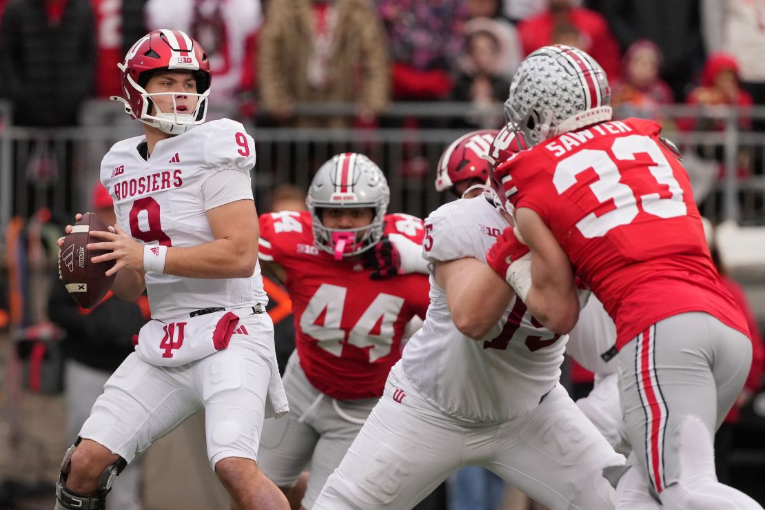 Kurtis Rourke (No. 9) of the Indiana Hoosiers drops back to pass against Ohio State.