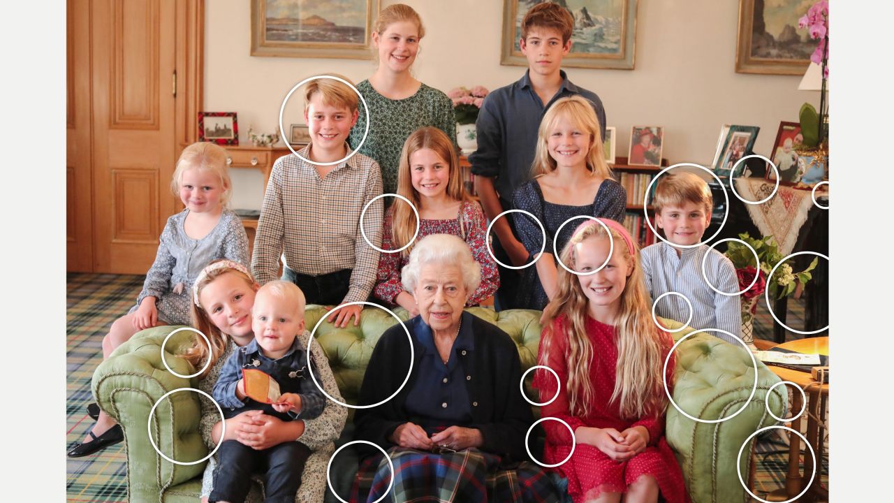 The photo, showing the Queen and ten of her young relatives, was published last year. CNN has circled areas showing visible digital inconsistencies.