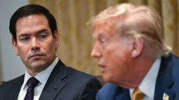 (L/R) US Secretary of State Marco Rubio looks on as President Donald Trump speaks during a cabinet meeting in the Cabinet Room of the White House in Washington, DC, on July 8, 2025.