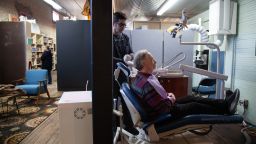 David Potts is treated by James Flanagin, the only dentist in Leslie, Arkansas, who operates<br />out of a small clinic in the back of an antique store. About 25 million Americans live in<br />dentist shortage areas, according to new research from Harvard University.” class=”image__dam-img image__dam-img–loading” onload=”this.classList.remove(‘image__dam-img–loading’)” onerror=”imageLoadError(this)” height=”2000″ width=”3000″ loading=”lazy”></picture>    </div>
<div class=