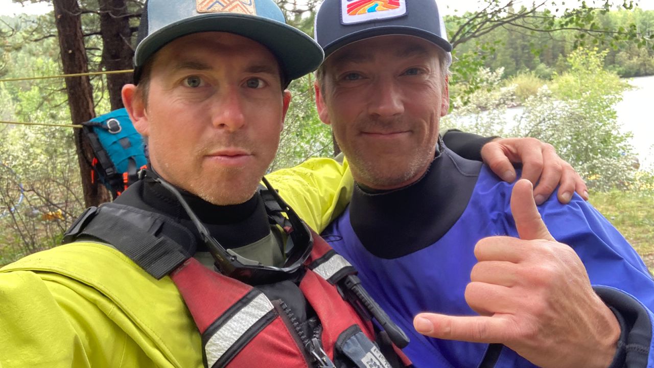 Ryan Titchener, left, and James Gillese on a guided raft trip down the Chilko River in British Columbia. Both men lost their homes in Jasper in the wildfire.