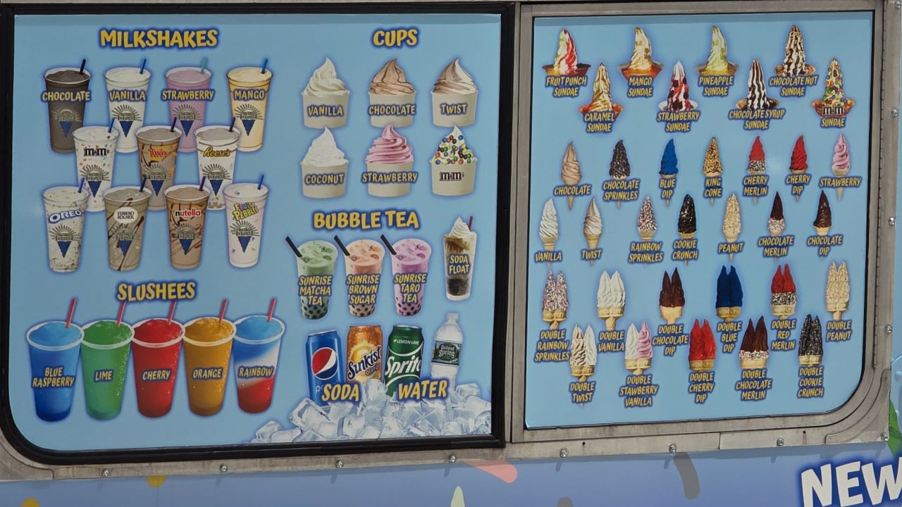 A closeup of an ice cream truck menu that's slightly darker