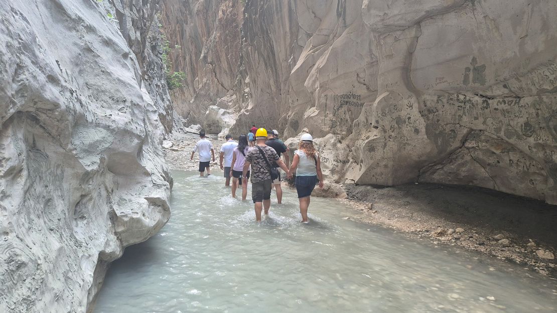 Hard hats are advised in the narrow canyon, where rocks can fall from the steep sides.