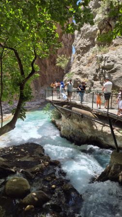 <strong>Making an entrance:</strong> Visitors enter the gorge through a walkway suspended over the fast-flowing river.