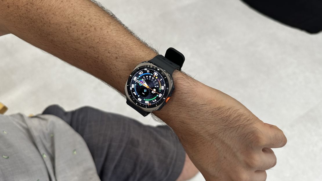 Samsung Galaxy Watch Ultra on a wrist, open to a data-heavy watch face.