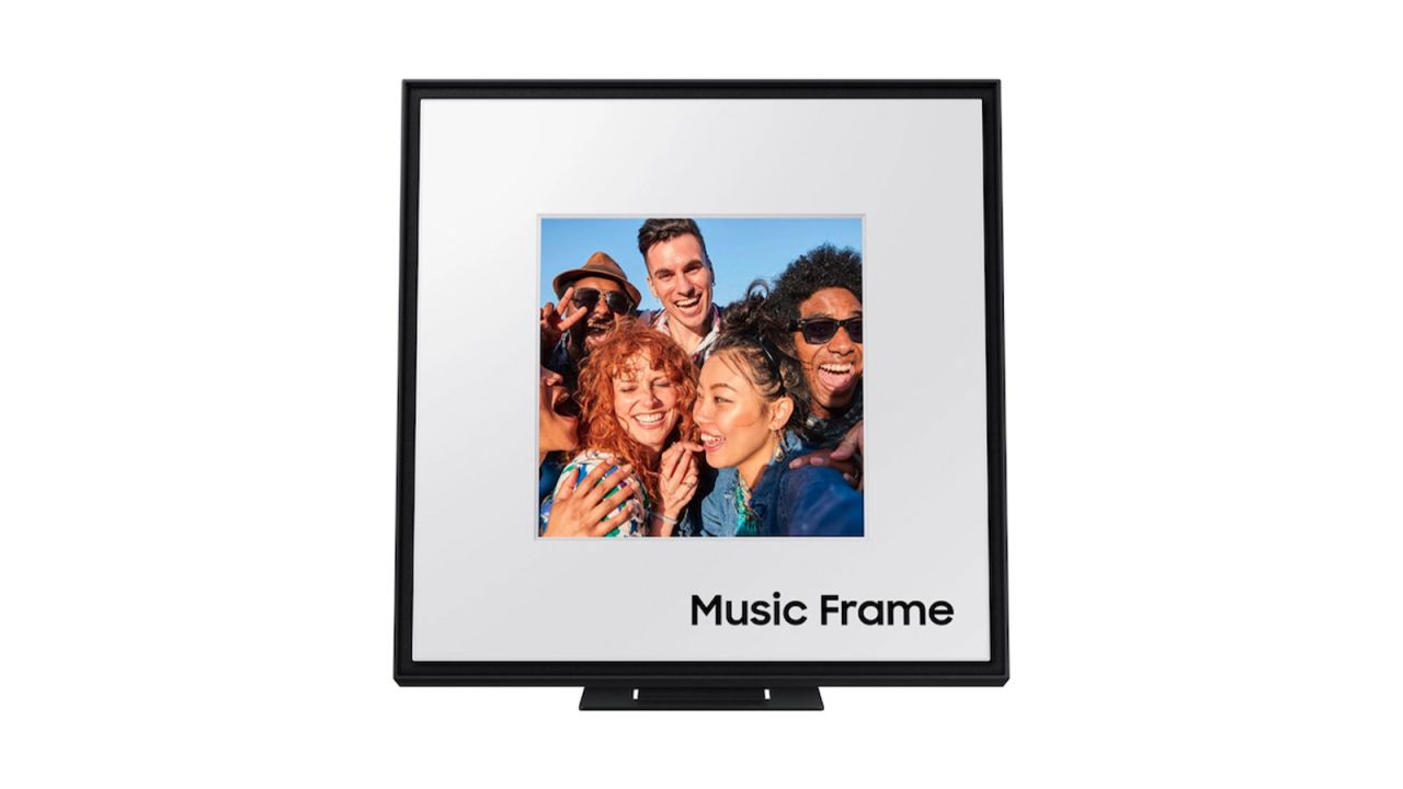 The Samsung Music Frame, displaying a photo of six friends smiling, on a white background.