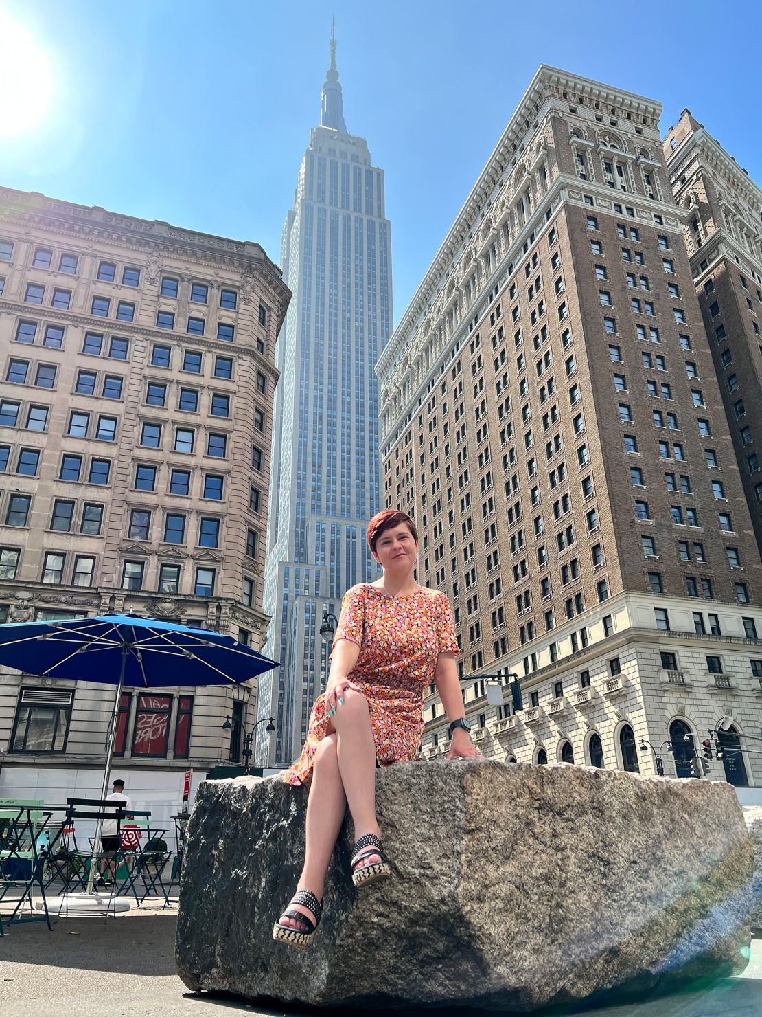 Sassy Wyatt is pictured in the foreground with the imposing Empire State Building in the background.