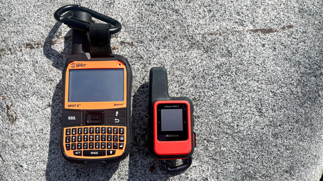 The Spot X and Garmin inReach Mini 2 on a rock.