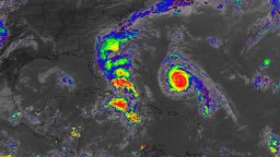 This satellite view from Sunday afternoon shows Hurricane Humberto on the right and Tropical Storm Imelda over the Bahamas.