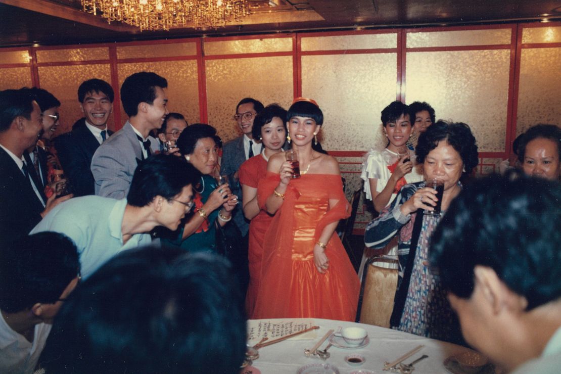 Lau's mother pictured at her wedding in the 1980s in a self-designed gown.